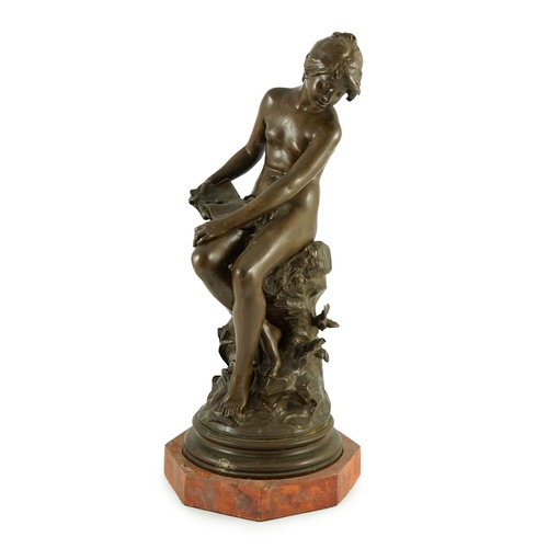 68 - Auguste Moreau (French, 1834-1917). A bronze figure of a nude girl seated on a mound holding a book ... 