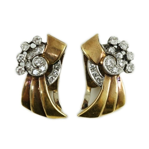 712 - A pair of 1940's/1950's continental gold and diamond cluster set fan shaped ear clips, 26mm, gross w... 