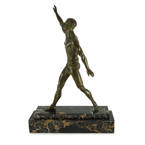 74 - Editions Reverolis of Paris. A 1930's French Art Deco bronze figure of a classical athlete standing ... 