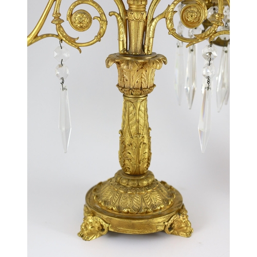 78 - A pair of 19th century Grecian revival ormolu two lights candelabra, with classical goddess finials,... 