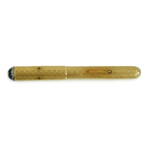 8 - A late 1930's 18ct gold cased and sapphire and diamond set side lever fountain pen, with Dunhill Nam... 