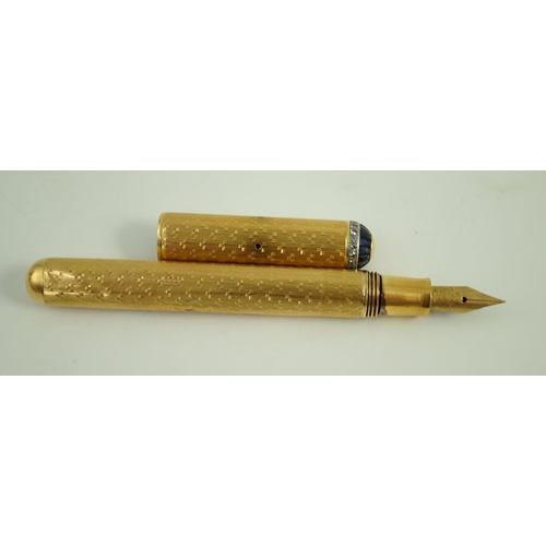 8 - A late 1930's 18ct gold cased and sapphire and diamond set side lever fountain pen, with Dunhill Nam... 