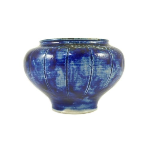 83 - A Martin Brothers blue glazed vase, dated 1912, of squat baluster form with incised vertical lines, ... 