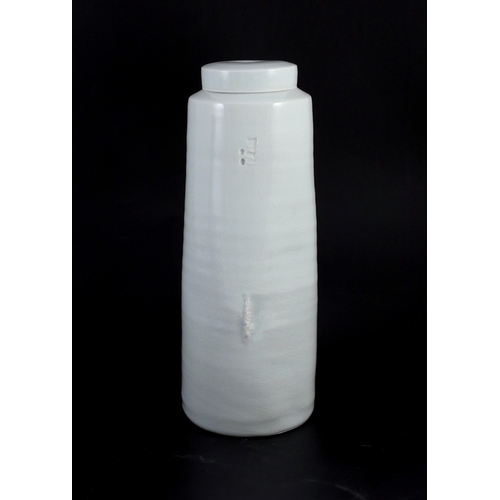 89 - § § Edmund de Waal (b.1964) a tall porcelain lidded jar, c.1993, covered in a pale celadon glaze, im... 