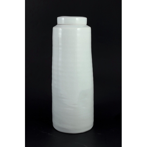 89 - § § Edmund de Waal (b.1964) a tall porcelain lidded jar, c.1993, covered in a pale celadon glaze, im... 