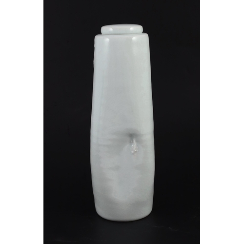 91 - § § Edmund de Waal (b.1964) a tall dimpled porcelain lidded vase, c.1993, covered in a pale celadon ... 