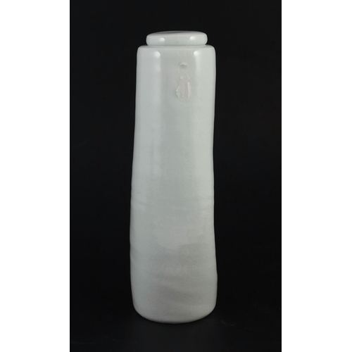 91 - § § Edmund de Waal (b.1964) a tall dimpled porcelain lidded vase, c.1993, covered in a pale celadon ... 