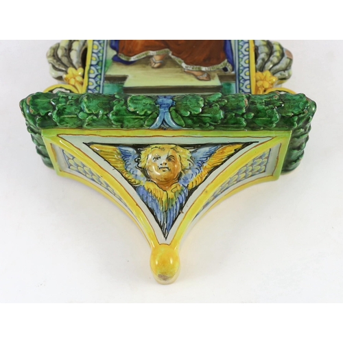 95 - A Cantagalli maiolica holy water stoop, late 19th century/early 20th century, The arched back panel ... 