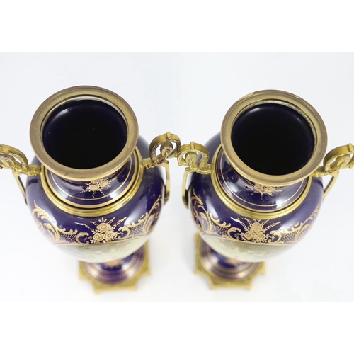 96 - A pair of Sevres style porcelain and ormolu mounted vases, late 20th century, each decorated with fi... 