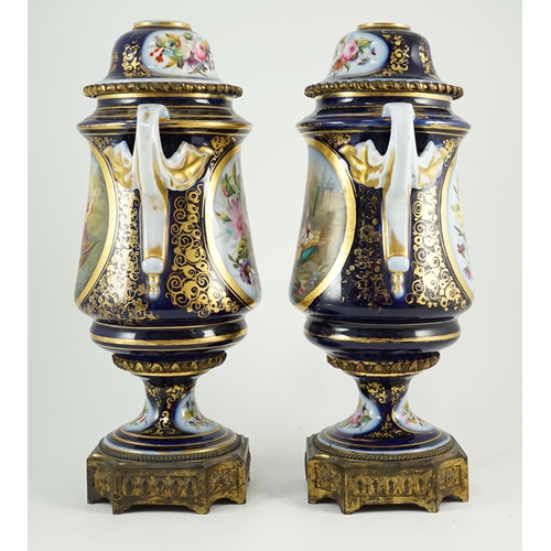 99 - A pair of Sevres style Paris porcelain and ormolu mounted oil lamps, late 19th century, each painted... 