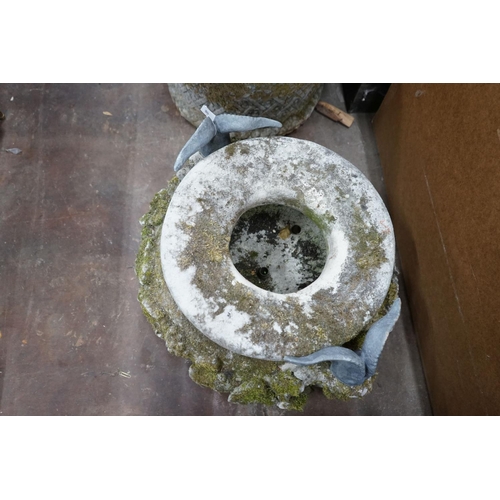 1011 - A large circular reconstituted stone ram's head garden planter / fountain head, diameter 66cm, heigh... 