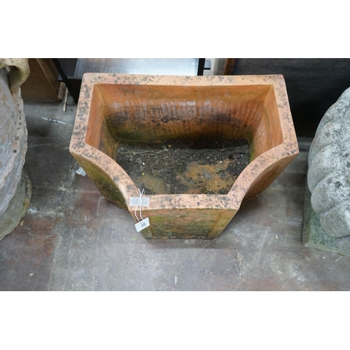 1013 - A terracotta garden planter of shaped rectangular form, width 52cm, depth 35cm, height 36cm