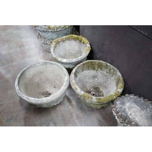 1016 - A set of three circular reconstituted stone garden planters with swagged bodies, diameter 48cm, heig... 