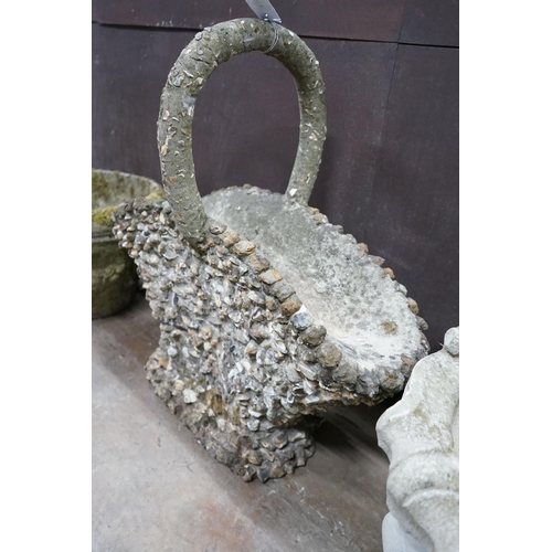 1017 - A pebble encrusted reconstituted stone basket garden planter, width 76cm, height 76cm