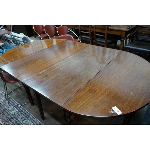 1034 - A George III mahogany D end extending dining table, extended 221cm width 132cm height 72cm