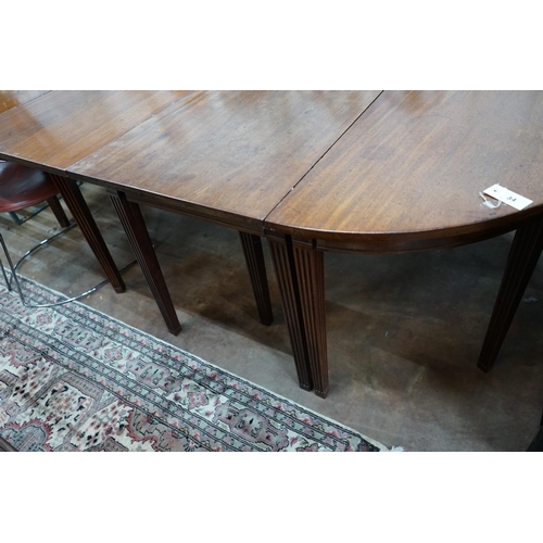 1034 - A George III mahogany D end extending dining table, extended 221cm width 132cm height 72cm