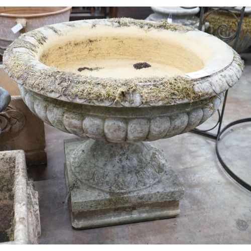 1060 - A large circular reconstituted stone campana garden urn, diameter 90cm, height 75cm