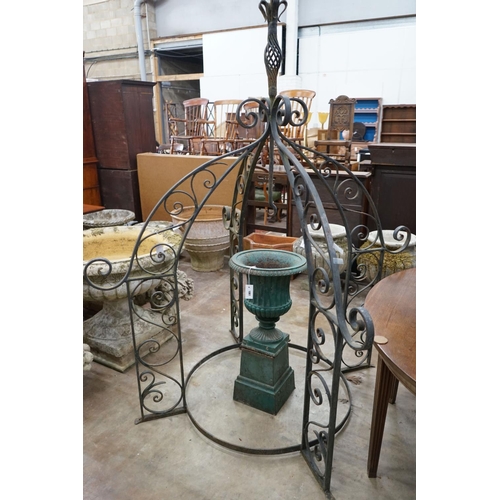 1062 - A painted wrought iron circular well head canopy, diameter 140cm, height 200cm