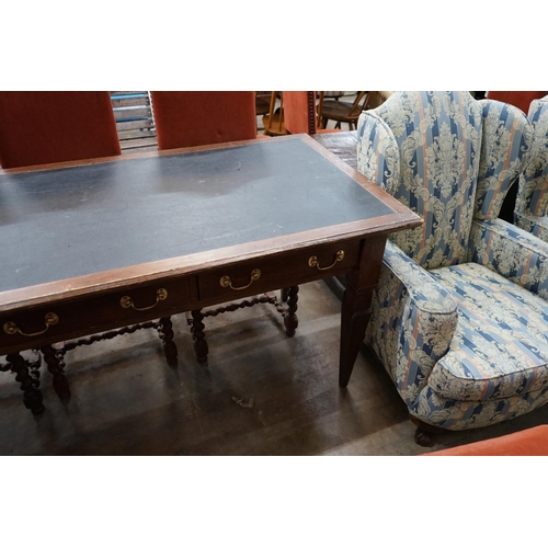 1071 - An early 20th century rectangular mahogany three drawer library table, width 190cm depth 79cm height... 