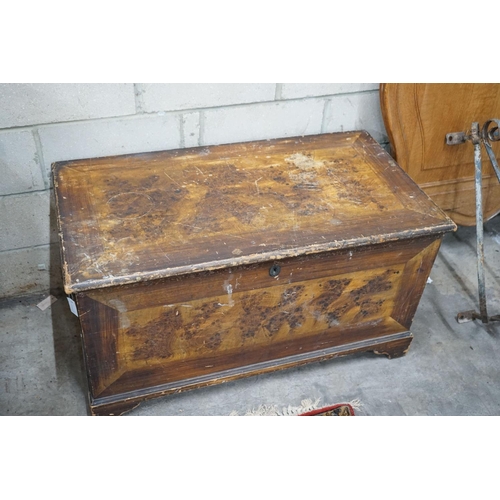 1075 - A Victorian pine trunk with simulated painted grain, width 108cm, depth 58cm, height 60cm