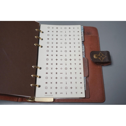 1480 - A leather Louis Vuitton brown monogram pattern repertoire agenda case, in original box