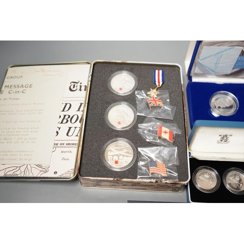 1483 - Cased Royal Mint UK proof coins  a Diana Memorial silver coin, a Millennium £5, a D-day 3 coin silv... 