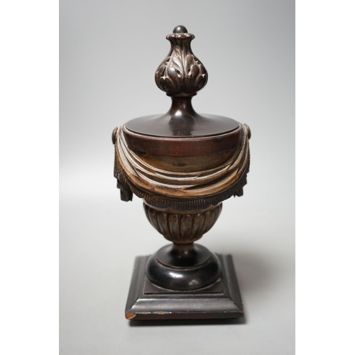 1489 - E. H. Pinto collection - a 19th century painted treen neo classical urn,28cms high.