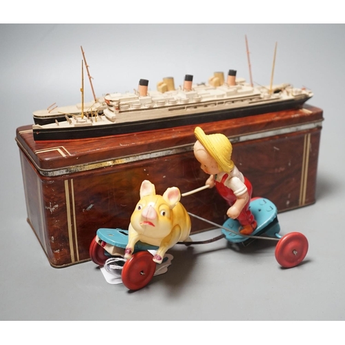 1490 - Bassett-Lowke Waterline Model Ships and a Japanned boxed celluloid pig chaser toy, 9cms high.... 