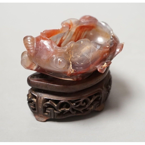 1491 - A late 19th / early 20th century Chinese agate brushwasher, wood stand - 8cm tall