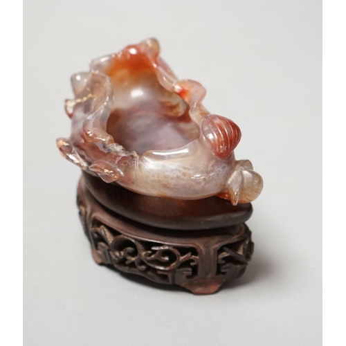 1491 - A late 19th / early 20th century Chinese agate brushwasher, wood stand - 8cm tall