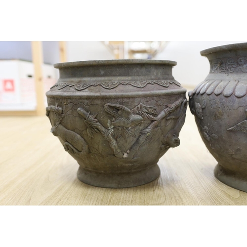 1493 - Two Japanese bronze planters,top being 25 cms diameter.