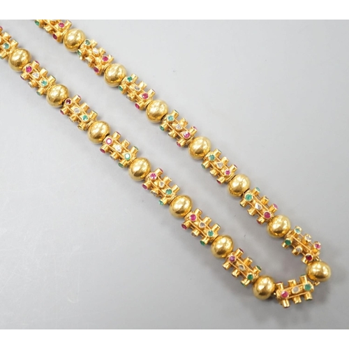 1916 - A modern Thai yellow metal and multi gem set necklace, 70cm, gross weight 55.1 grams.