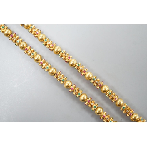 1916 - A modern Thai yellow metal and multi gem set necklace, 70cm, gross weight 55.1 grams.