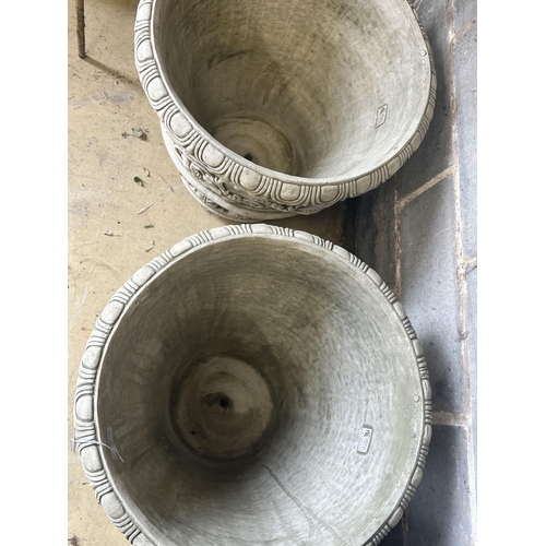 10 - A pair of large reconstituted stone circular garden planters, diameter 55cm height 49cm
