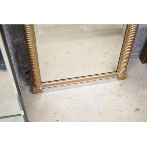 39 - A Regency giltwood and gesso shell-moulded pier glass, width 60cm, height 94cm