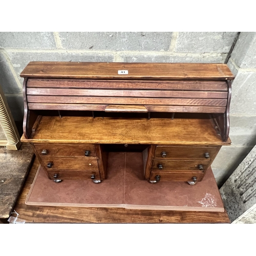 41 - A miniature mahogany and hardwood kneehole tambour desk, width 69cm, depth 22cm, height 45cm.