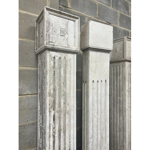 44 - Four painted wood fluted square columns, tallest 222cm