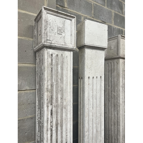 44 - Four painted wood fluted square columns, tallest 222cm