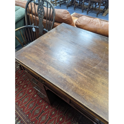 47 - A late Victorian mahogany kneehole desk, length 107cm, height 80cm