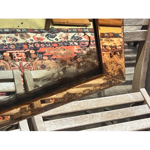 49 - An Art Deco style peach and clear glass wall mirror, width 55cm height 80cm