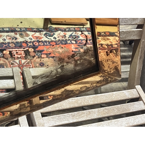 49 - An Art Deco style peach and clear glass wall mirror, width 55cm height 80cm