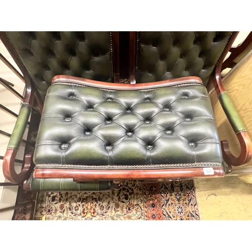 54 - A pair of Victorian style mahogany and buttoned green leather open armchairs and matching footstool... 