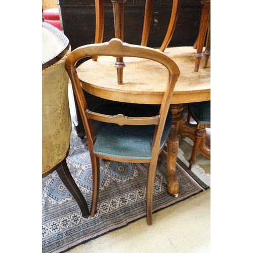 58 - A Victorian burr walnut oval topped dining table, width 120cm, depth 85cm, height 70cm together with... 
