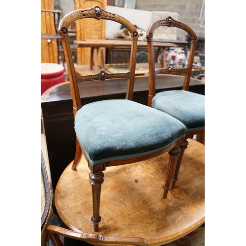 58 - A Victorian burr walnut oval topped dining table, width 120cm, depth 85cm, height 70cm together with... 