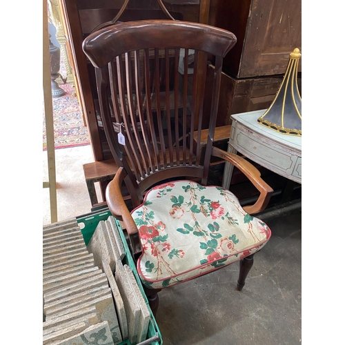 1001 - A late Victorian / Edwardian mahogany lathe back armchair with solid seat, width 63cm, depth 48cm, h... 