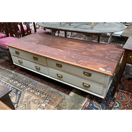 1033 - A large modern painted four drawer coffee table on wrought iron feet, length 180cm, depth 80cm, heig... 