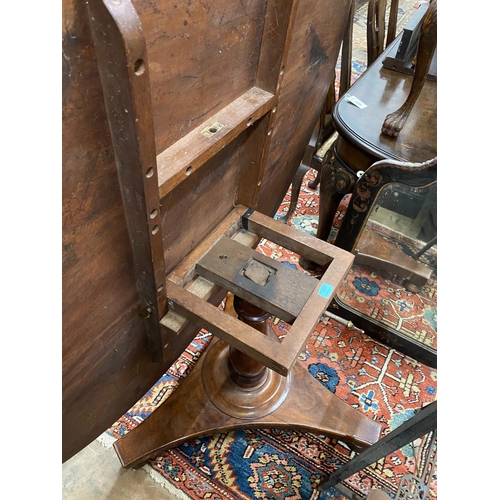 1037 - An early Victorian mahogany circular tilt top breakfast table, diameter 140cm, height 72cm