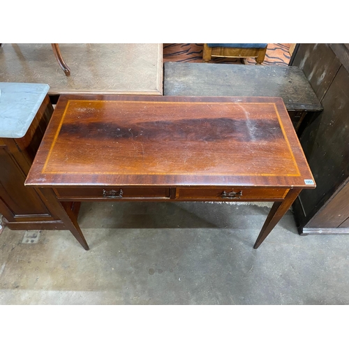 1051 - An Edwardian satinwood banded mahogany two drawer side table, width 105cm, depth 52cm, height 71cm... 