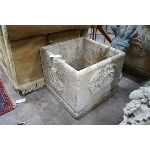 1063 - A pair of square reconstituted stone Fleurs de Lys garden planters, width 45cm, height 42cm