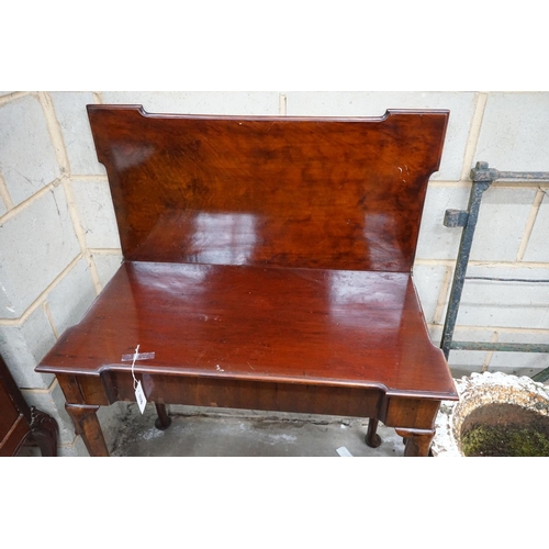 1076 - A George III rectangular mahogany folding tea table, width 86cm, depth 43cm, height 73cm